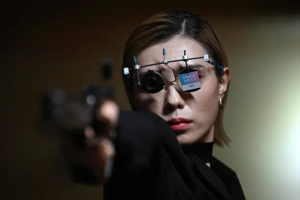 والد كيم اعترض بشدة على ممارستها رياضة الرماية (أ.ف.ب)