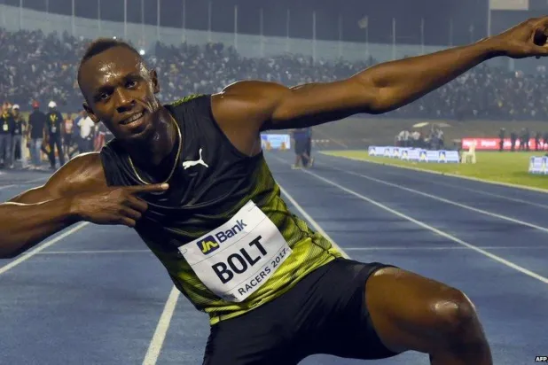 Usain Bolt, kısa mesafe koşucusu Gout Gout'a bazı bilgece sözler söyledi (AFP)