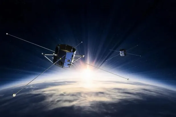 Bir sanatçının resmettiği, uzayda NASA'nın İkili Yeniden Bağlantı ve Kutup Elektrodinamik Keşif Uyduları (Tandem Reconnection and Cusp Electrodynamics Reconnaissance Satellites, TRACERS). Görevde, Güneş'teki aktivitenin Dünya'nın etrafında, gezegenin manyetik alanının hakim olduğu bölgeyle etkileşime girdiği manyetik yeniden bağlanma araştırılacak (NASA aracılığıyla Millennium Space Systems)