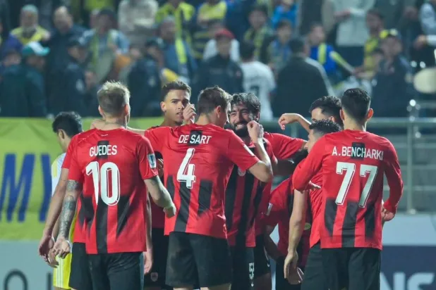 فرحة لاعبي الريان بهدف الفوز على باختاكور (نادي الريان)