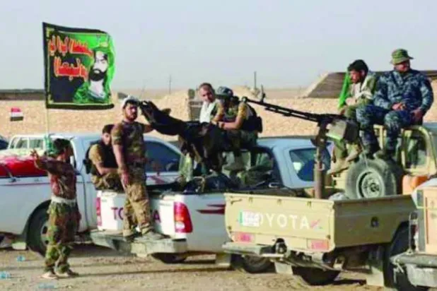 أرشيفية لمجموعة من الميليشيات التابعة لـ«الحرس الثوري» الإيراني في دير الزور (المرصد السوري)