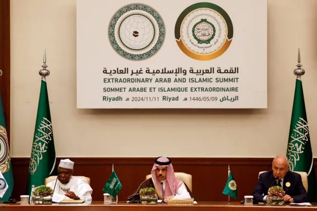 Saudi Foreign Minister Prince Faisal bin Farhan bin Abdullah, Secretary General of the Organization of Islamic Cooperation Hissein Brahim Taha, and Arab League Secretary-General Ahmed Aboul Gheit attend a press conference, following the Arab-Islamic extraordinary summit held to investigate Israel's conflict with Hamas in Gaza and Hezbollah in Lebanon, in Riyadh, Saudi Arabia, November 11, 2024. (Reuters) 
