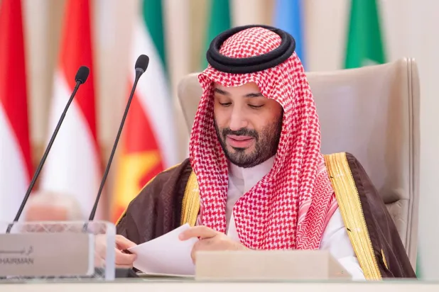 A handout picture provided by the Saudi Press Agency SPA on November 11, 2024, shows Saudi Crown Prince Mohammed bin Salman addressing the joint extraordinary leaders summit of the Organization of Islamic Cooperation (OIC) and the Arab League in Riyadh. (Photo by SPA / AFP) 