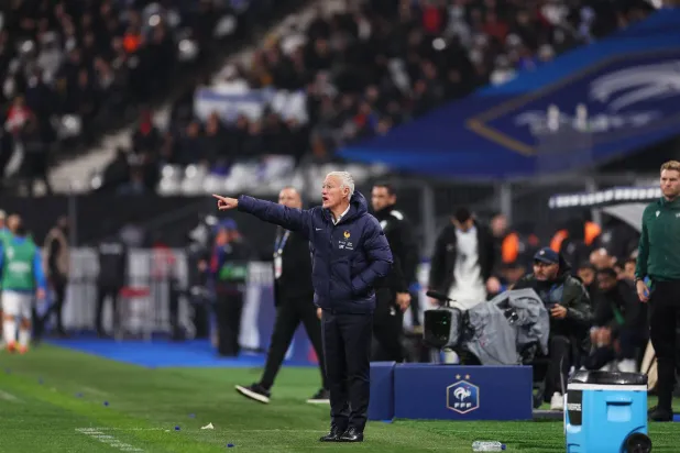 ديشان ليس سعيداً بالنتيجة (أ.ف.ب)