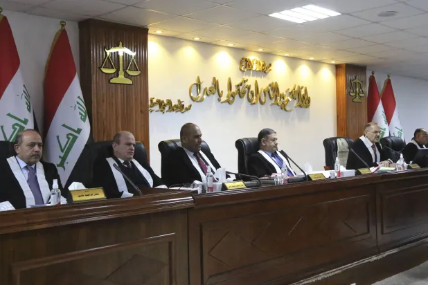 القضاء العراقي طالب الأشخاص الذين يشعرون أنهم عرضة لعملية «تنصت» باللجوء إلى القضاء لإنصافهم (أ.ف.ب)