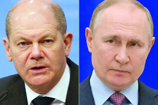 بوتين شولتس (أ.ف.ب)