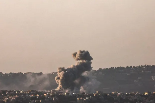 Smoke rises as a result of an Israeli airstrike on the village of al-Khiam in southern Lebanon, as seen from the Israeli side of the border, northern Israel, 22 November 2024, amid cross-border hostilities between Hezbollah and Israel. (EPA)