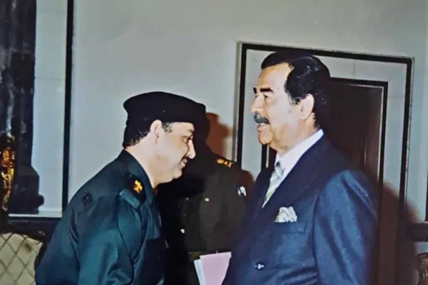 Saddam Hussein and Jamal Mustafa Sultan.