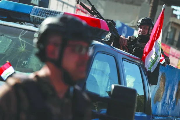 عناصر من الأمن العراقي في شوارع بغداد (د.ب.أ)