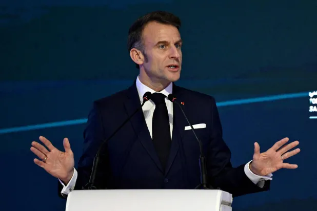 French President Emmanuel Macron speaks during the Saudi-French Business Forum during an official visit in Riyadh on December 3, 2024. (Photo by JEANNE ACCORSINI / POOL / AFP)