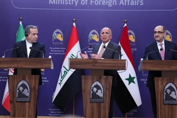 وزير الخارجية فؤاد حسين يتوسط وزيرَي خارجية إيران وسوريا (وزارة الخارجية)