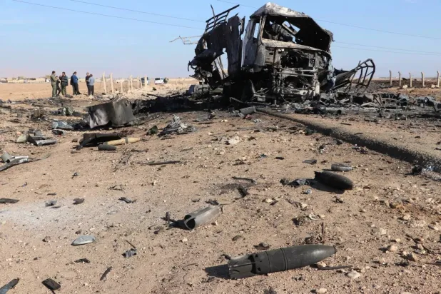 Destroyed vehicles at the 54th Brigade in Syria’s Qamishli after Israeli airstrikes targeted it. (Asharq Al-Awsat)