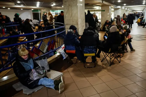 People take shelter inside a metro station during a Russian military strike, amid Russia's attack on Ukraine, in Kyiv, Ukraine December 13, 2024. REUTERS/Alina Smutko