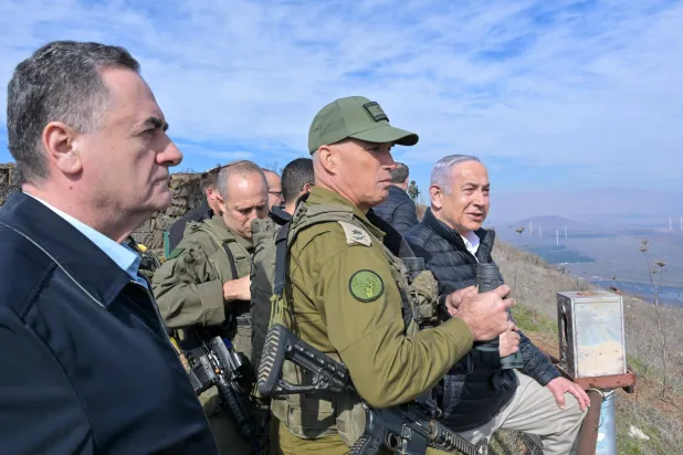 08 December 2024, Israel, Golan Heights: Israeli Prime Minister Benjamin Netanyahu (R) and Defense Minister Israel Katz (L) visit an observation point on Mt. Bental on the Golan Heights bordering Syria. Photo: Koby Gideon/GPO/dpa 
