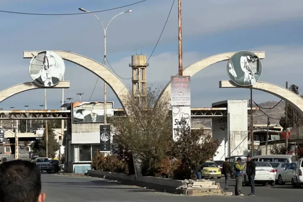 The Jdeidet Yabous Syrian border crossing, where images of Assad and his father appear to have been defaced (Asharq Al-Awsat).