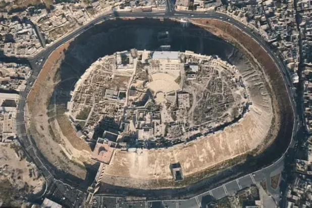 During the four years of fighting before Assad's forces recaptured Aleppo following a devastating siege, the city was virtually emptied - AFP