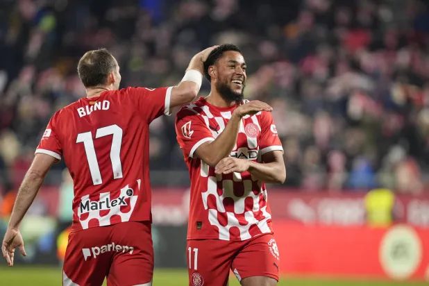 Girona's Arnaut Danjuma poses after scoring the 3-0 goal during the Spanish LaLiga soccer match between Girona FC and Real Valladolid CF, in Girona, Spain, 20 December 2024.  EPA/DAVID BORRAT