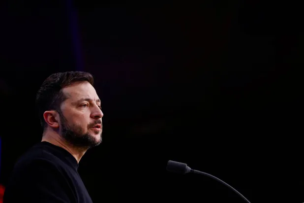 Ukraine's President Volodymyr Zelenskiy speaks as he attends a European Union leaders summit in Brussels, Belgium, December 19, 2024. REUTERS/Johanna Geron