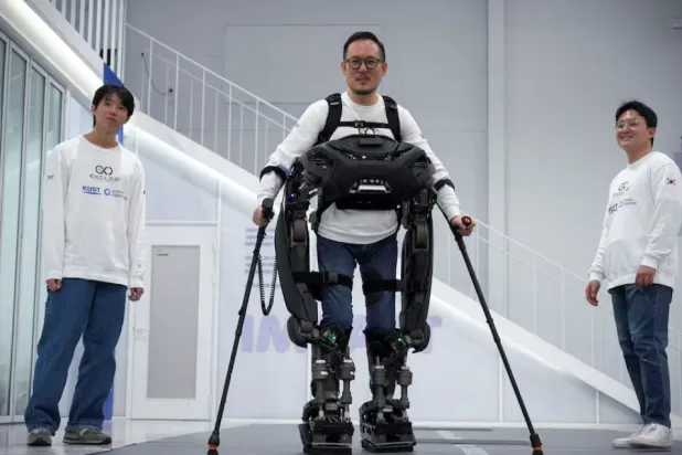 Kim Seung-hwan, who is himself a paraplegic and part of the Exoskeleton Laboratory team at the Korea Advanced Institute of Science and Technology (KAIST), demonstrates the prototype of exoskeleton robot 'WalkON Suit F1' at KAIST in Daejeon, South Korea, November 27, 2024. REUTERS/Sebin Choi P