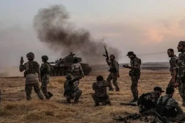 Halep’in doğusunda SDG ile çatışan Türkiye’ye yakın grupların üyeleri (SOHR)