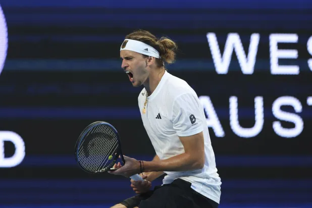 Alexander Zverev of Germany celebrates a crucial point from Zhizhen Zhang of China during their United Cup tennis match in Perth, Australia, Monday, Dec. 30, 2024. (AP Photo/Trevor Collens)