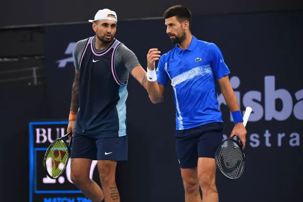 Novak Djokovic (R) of Serbia and Nick Kyrgios (L) of Australia react during their doubles match against Nikola Mektic of Croatia and Michael Venus of New Zealand at the Brisbane International tennis tournament in Queensland Tennis Center in Brisbane, Australia, 01 January 2025. EPA/JONO SEARLE