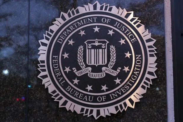 The seal of the Federal Bureau of Investigation (FBI) is seen on the Headquarters in Washington, Saturday, Dec. 7, 2024. (AP) 