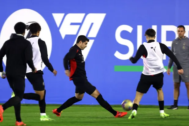 موراتا لاعب الميلان خلال استعدادات فريقه لمواجهة السوبر (أ.ف.ب)