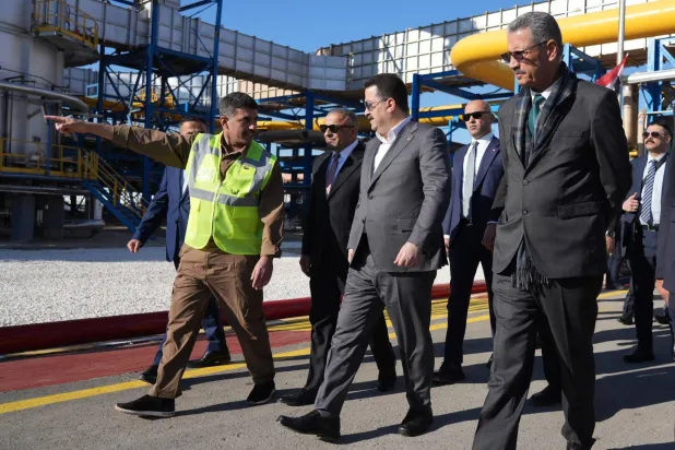A handout picture released by the Iraqi Prime Minister's Media Office on January 2, 2025, shows Mohammed Shia al-Sudani during the inauguration ceremony of the fourth and fifth units at the oil refinery of Baiji. (Photo by IRAQI PRIME MINISTER'S PRESS OFFICE / AFP)