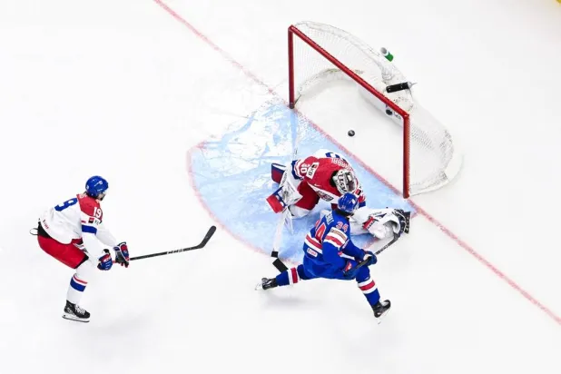 Gabe Perreault #34 of Team USA scores on goaltender Michael Hrabel #30 of Team Czechia in the first period of the semifinal match during the 2025 IIHF World Junior Championship at Canadian Tire Center on January 4, 2025 in Ottawa, Ontario, Canada. (Getty Images North America/Getty Images via AFP) 