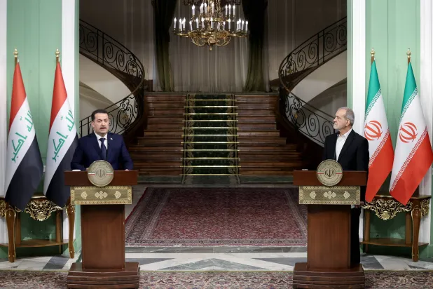 Sudani and Pezeshkian hold a joint press conference in Tehran. (Iranian presidency)