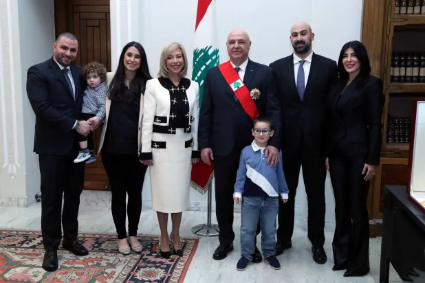 Newly-elected Lebanese President Joseph Aoun poses for a picture with his family at the presidential palace in Baabda, Lebanon, January 9, 2025. Dalati Nohra/Handout via REUTERS