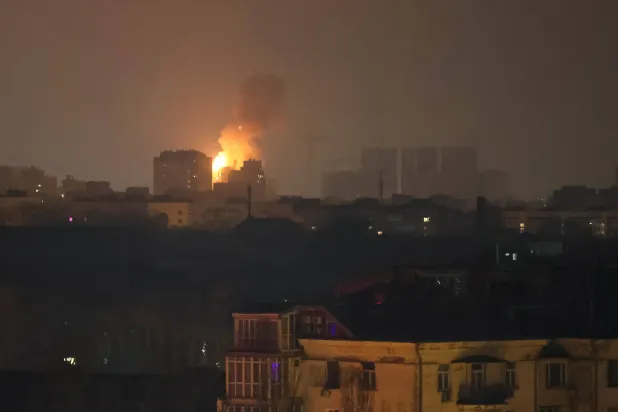 An explosion of a drone after it hit an apartment building is seen in the sky during a Russian drone strike, amid Russia's attack on Ukraine, in Kyiv, Ukraine January 10, 2025. REUTERS/Gleb Garanich