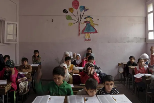 شملت التعديلات الجديدة حذف مادة التربية الوطنية كاملة من المناهج الدراسية (رويترز)