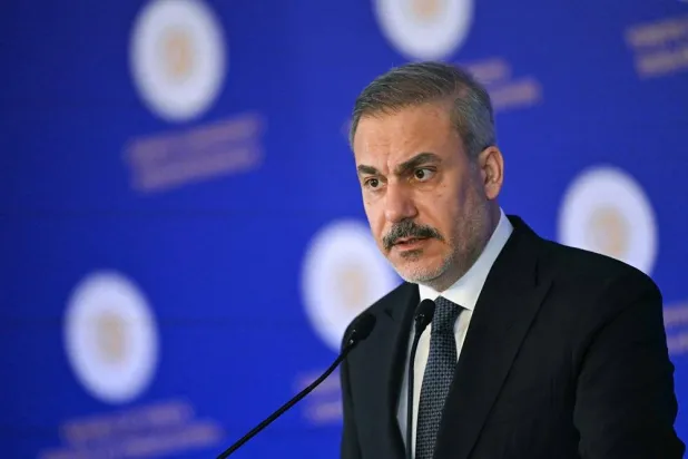 Turkish Minister of Foreign Affairs Hakan Fidan addresses the audience during a press briefing meeting to review the past year and to share insights regarding regional and global developments in Istanbul, on January 10, 2025. (AFP) 