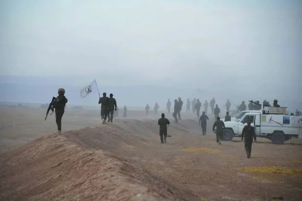 A joint force of the Iraqi army and Popular Mobilization Forces searches for ISIS members in the Nineveh province. (AFP)