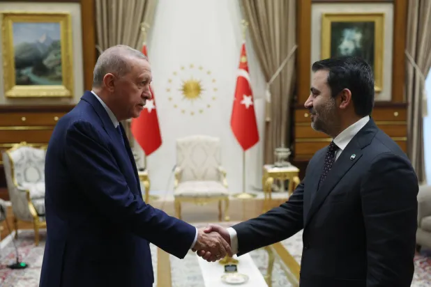 A handout photo made available by the Turkish Presidential Press Office shows Turkish President Recep Tayyip Erdogan (L) shaking hands with Syrian Foreign Minister Asaad al-Shibani (R) during their meeting in Ankara, Turkey, 15 January 2025. EPA/TURKISH PRESIDENTIAL OFFICE HANDOUT HANDOUT EDITORIAL USE ONLY/NO SALES