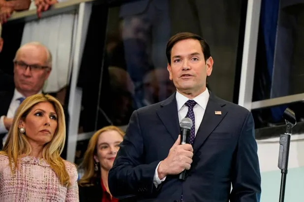 Newly confirmed US Secretary of State Marco Rubio speaks next to his wife Jeanette Dousdebes Rubio at the State Department in Washington, US, January 21, 2025. (Reuters)