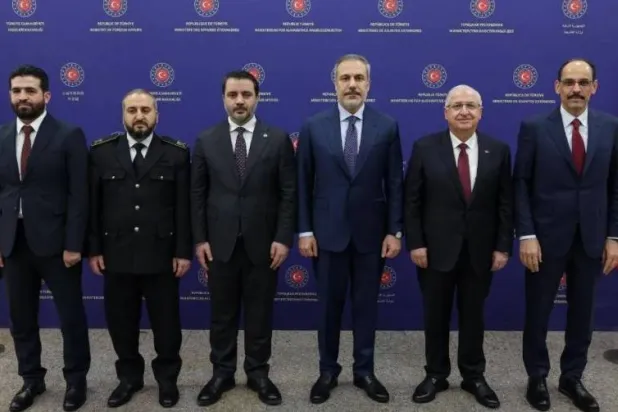 The foreign ministers, defense ministers, and intelligence chiefs of Türkiye and the Syrian administration during their meeting in Ankara in mid-January (Turkish Foreign Ministry)