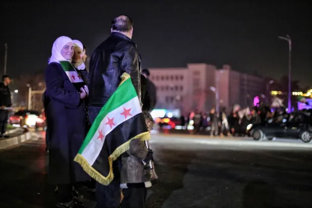 People celebrate in the streets after Syrian leader Ahmed al-Sharaa was named president to oversee a transitional period in Damascus, Syria, 29 January 2025. (EPA)