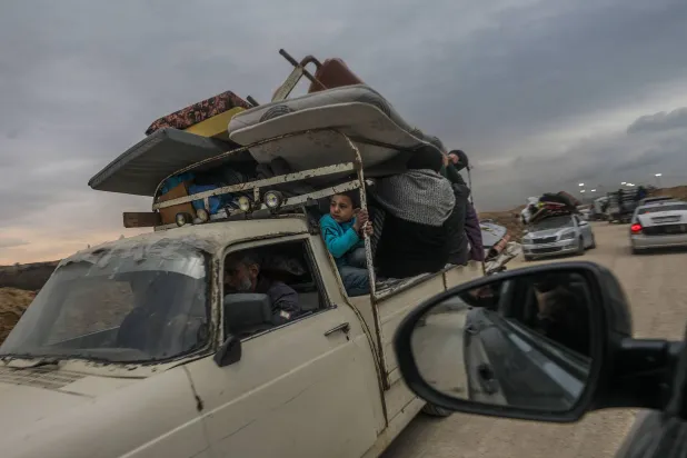 Palestinians travel from the southern Gaza Strip towards the north following the withdrawal of Israeli troops from the Netzarim Corridor, central Gaza Strip, 09 February 2025. EPA/MOHAMMED SABER