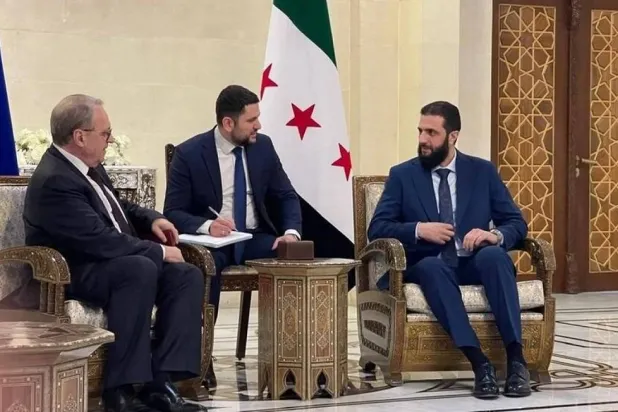 Syrian interim President Ahmed al-Sharaa and Russian Deputy Foreign Minister Mikhail Bogdanov meet in Damascus in late January. (RT) 