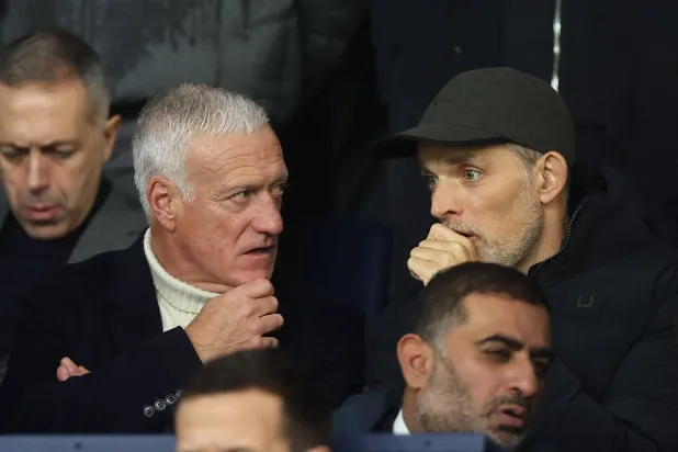 ديشان وتوخل خلال مباراة باريس سان جيرمان والسيتي (أ.ف.ب)