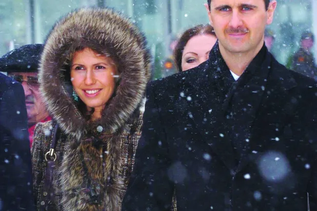 بشار وأسماء الأسد خلال زيارتهما الرسمية إلى موسكو عام 2005 (عمار عبد ربه)