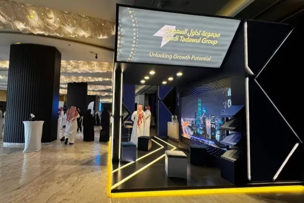 جناح «مجموعة تداول السعودية» في أحد المعارض (الشرق الأوسط)