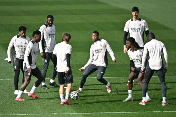 لاعبو الريال بمعنويات عالية خلال التدريبات قبل لقاء سيتي وبعد الفوز ذهابا (ا ف ب)