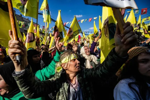 Syrian Kurds during a demonstration in Qamishli on February 15, demanding the release of Ocalan on the 26th anniversary of his arrest (AFP).