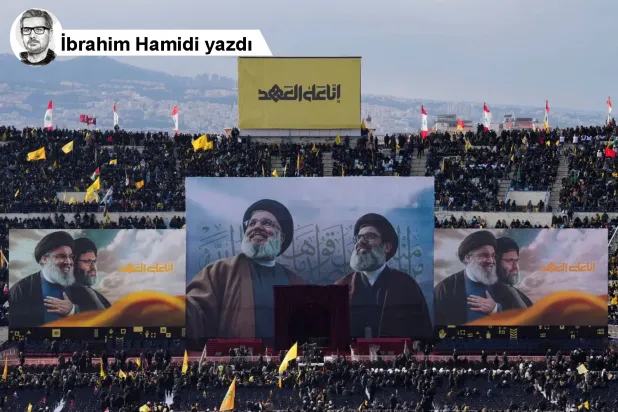 eyrut'un güneyindeki Kamil Şamun Stadyumu'nda Hasan Nasrallah ve Haşim Safiyuddin'in portreleri (Reuters)
