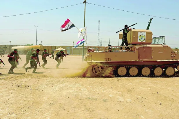 
تمرين عسكري لفصائل من «الحشد الشعبي» في العراق (أ.ب)