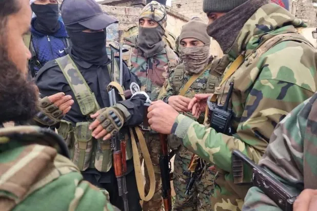 Defense ministry and security forces gather in Daraa’s town of al-Sanamayn. 